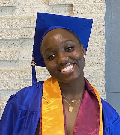 girl in blue cap and gown