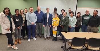 Students with Partner at Environmental Resources Management Ian Gayman, MBA '23